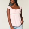 Top babydoll con lazo de satén