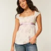 Top babydoll con lazo de satén
