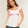 Top babydoll con lazo de satén