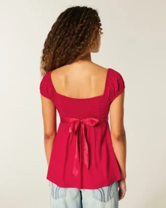 Top babydoll con lazo de satén