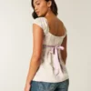Top babydoll con lazo de satén