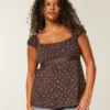 Top babydoll con lazo de satén