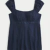 Top babydoll con lazo de satén