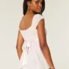 Top babydoll con lazo de satén