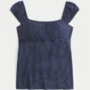 Top babydoll con lazo de satén