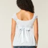 Top babydoll con lazo de satén