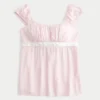 Top babydoll con lazo de satén