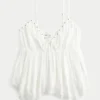 Top babydoll con tachuelas
