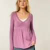 Top babydoll de manga larga con pinzas en el pecho