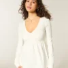 Top babydoll de manga larga con pinzas en el pecho