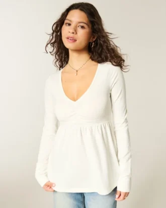 Top babydoll de manga larga con pinzas en el pecho
