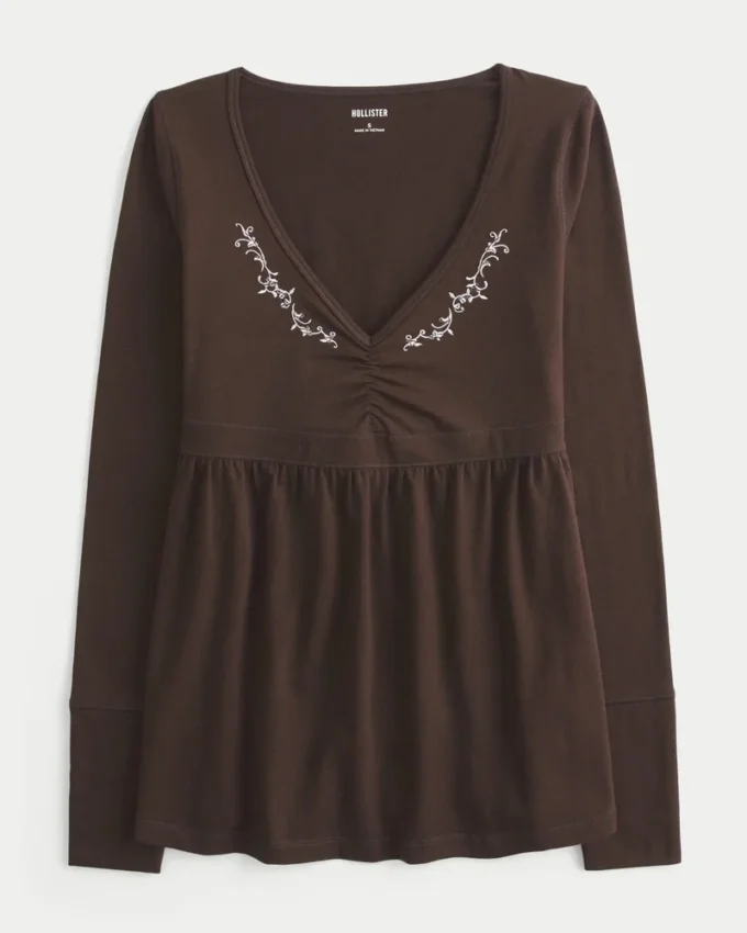 Top babydoll de manga larga con pinzas en el pecho
