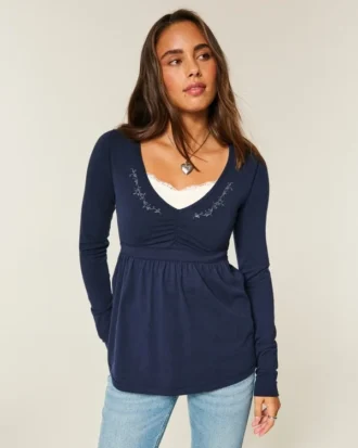 Top babydoll de manga larga con pinzas en el pecho