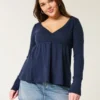 Top babydoll de manga larga con punto calado
