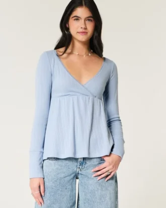 Top babydoll de manga larga con punto calado