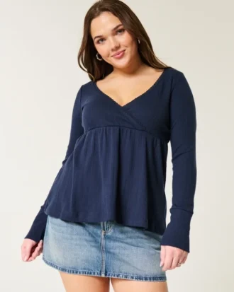 Top babydoll de manga larga con punto calado