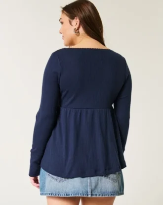 Top babydoll de manga larga con punto calado