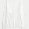 Top babydoll de manga larga con punto calado