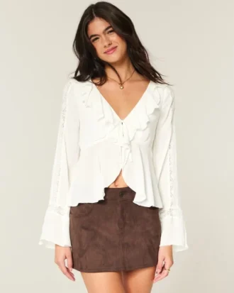 Top babydoll de manga larga con volantes
