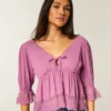 Top babydoll de manga tres cuartos