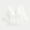 Top babydoll de manga tres cuartos