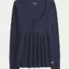 Top babydoll Henley con lazo fácil de atar