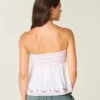 Top babydoll sin tirantes con bordado