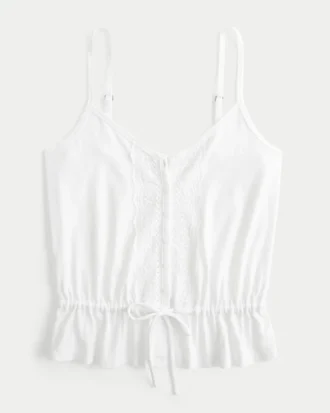 Top con peplum y detalles de encaje
