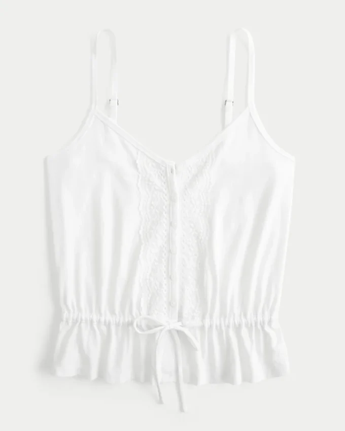 Top con peplum y detalles de encaje