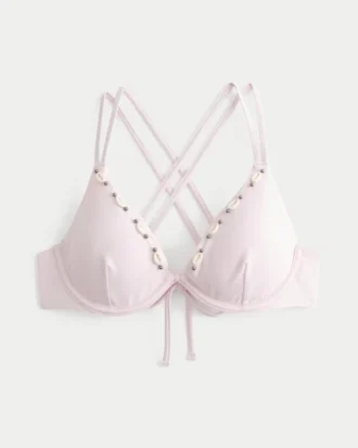 Top de bikini con aros, tirantes cruzados en la espalda y adornos de conchas