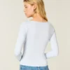 Top de manga larga sin costuras con cuello en V