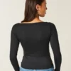 Top de manga larga sin costuras con cuello en V