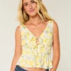 Top peplum con lazo delantero en mezcla de lino
