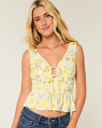Top peplum con lazo delantero en mezcla de lino