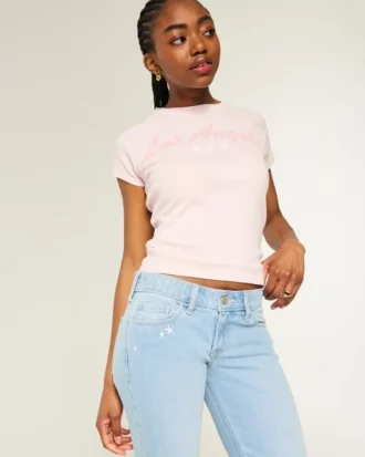 Vaqueros bootcut de talle bajo con bordado de estrellas