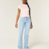 Vaqueros bootcut de talle bajo con bordado de estrellas