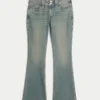 Vaqueros bootcut de talle bajo con bordado de mariposas y lavado medio