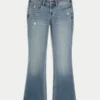 Vaqueros bootcut de talle bajo, lavado medio y efecto desgastado