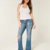 Vaqueros bootcut de talle bajo, lavado medio y rotos