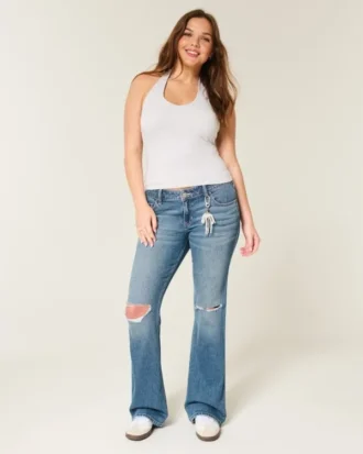 Vaqueros bootcut de talle bajo, lavado medio y rotos