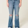 Vaqueros bootcut de talle bajo, lavado medio y rotos