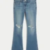 Vaqueros bootcut de talle bajo, lavado medio y rotos