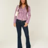 Vaqueros bootcut de talle bajo y lavado oscuro