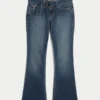 Vaqueros bootcut de talle bajo y lavado oscuro con cinturón
