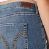 Vaqueros bootcut de talle medio y lavado medio