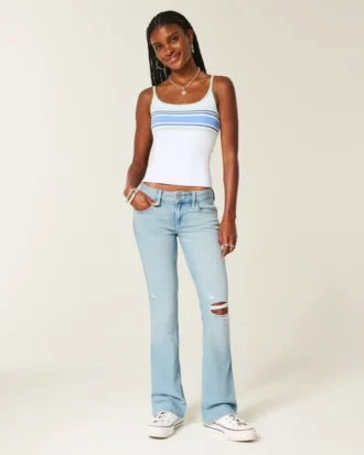 Vaqueros bootcut rasgados de lavado claro y talle bajo con bordados