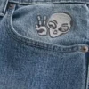 Vaqueros holgados con estampado Alien, lavado medio Vaqueros holgados con estampado Alien, lavado medio