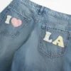 Vaqueros holgados con estampado de Los Ángeles, lavado medio y talle bajo