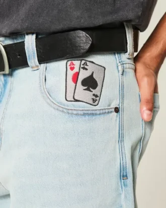 Vaqueros holgados con estampado de naipes y lavado claro
