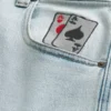 Vaqueros holgados con estampado de naipes y lavado claro